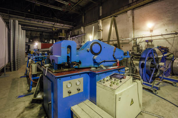 istock Metal sheet profiling factory. New modern roll forming machine 1085803586