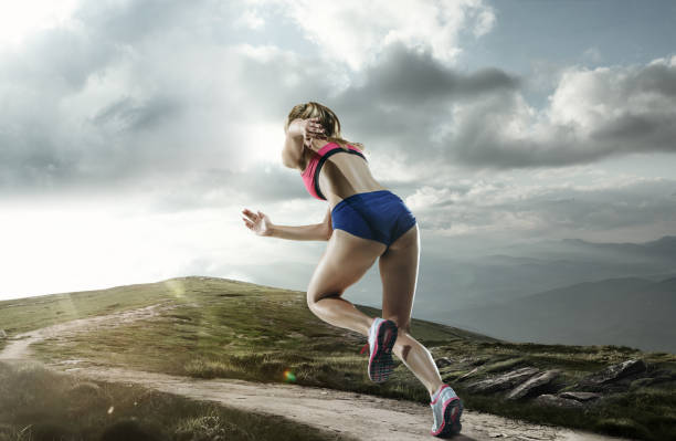 istock The woman running and training on running track 1085803602