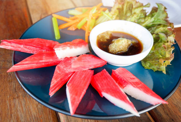 istock crab stick on plate egetable lettuce salad crab stick wasabi sauce cup surimi salad or fish stick piece 1085814180