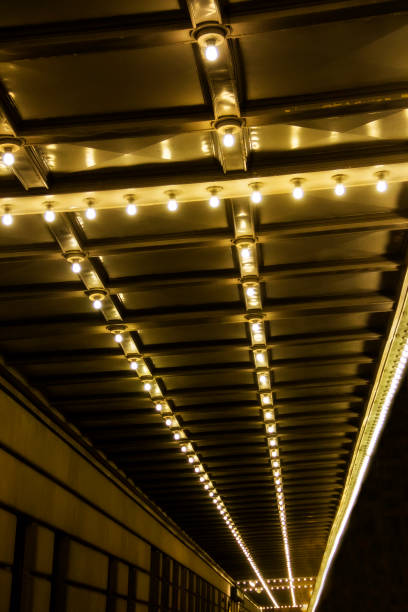 istock row of light bulbs on a ceiling at night 1085815958
