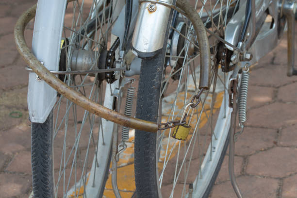 istock Bicycle locked together in the park. 1085818858