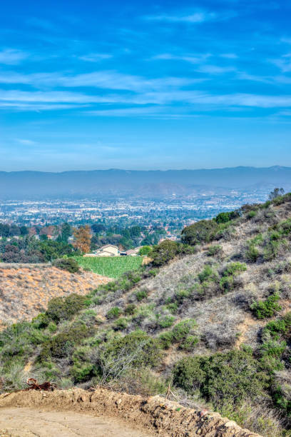 istock Dirt road above the city 1085831482