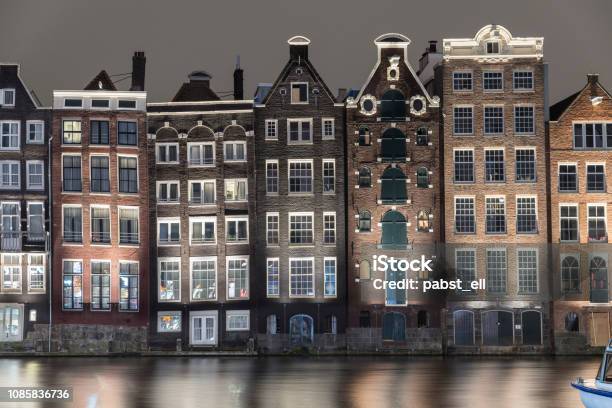Amsterdam Skyline Closeup Buildings Waterfront Damrak Stock Photo - Download Image Now
