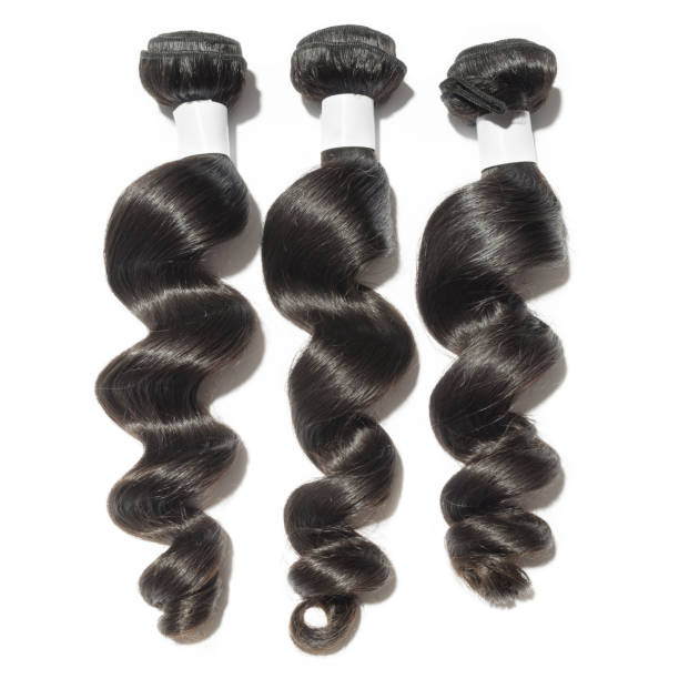cheveux humains lâche spirale ondulée noire tisse des faisceaux d’extensions - bundle photos et images de collection