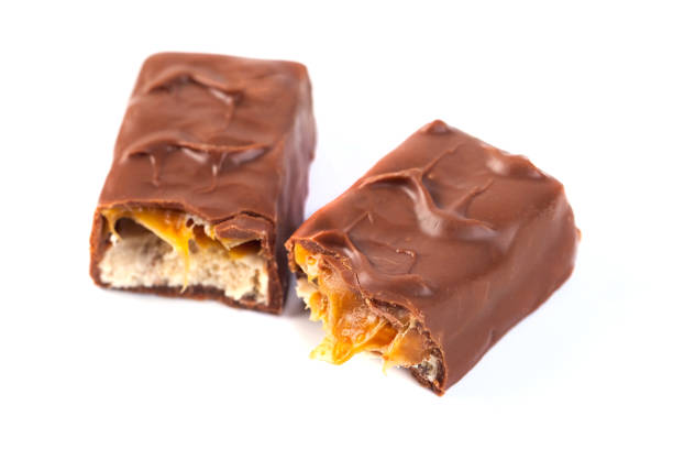 istock Chocolate bar with caramel isolated on white 1085850100