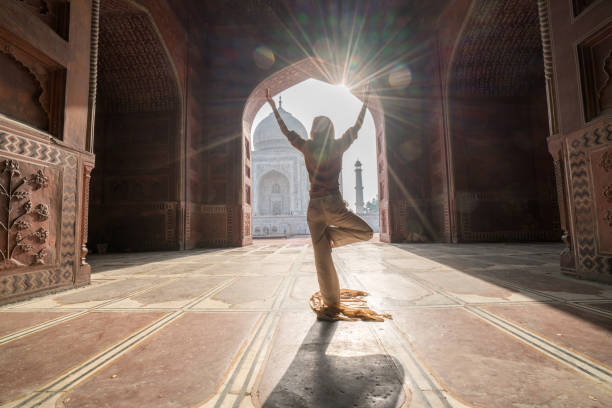 istock Standing tree yoga position in India 1085852032
