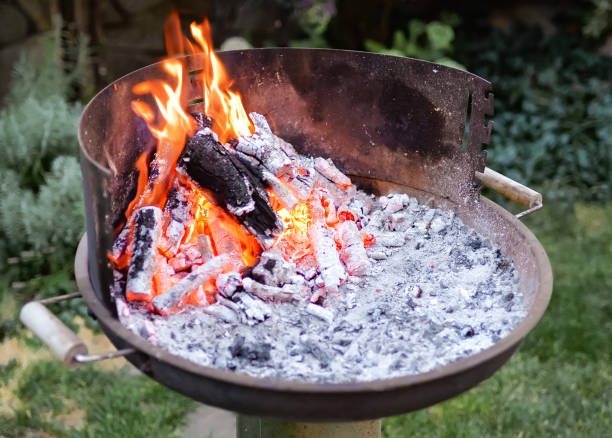 istock Flaming grill with open fire, ready for product placement. 1085861704