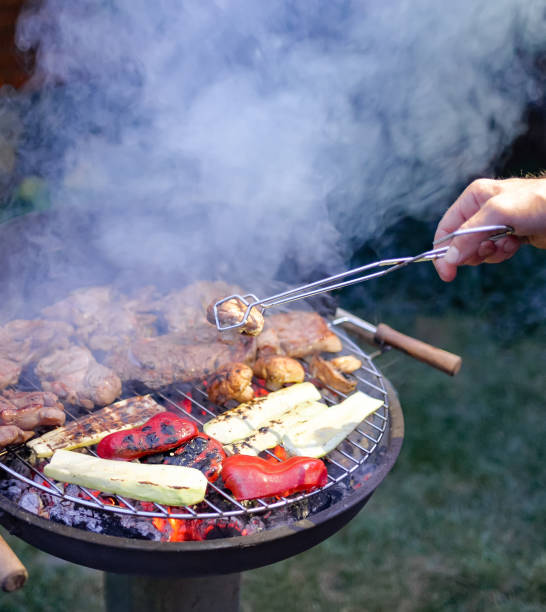 istock Cooking barbecue vegetables and meat. Chargrill. 1085861716
