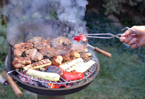 istock Cooking barbecue vegetables and meat. Chargrill. 1085861728