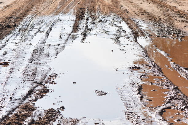 istock Traces of a car in the mud 1085863772