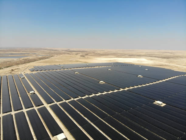 istock Solar panels power station field farm 1085890816