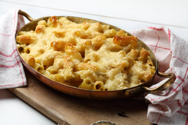 istock Macaroni and cheese in a copper pan 1085896234