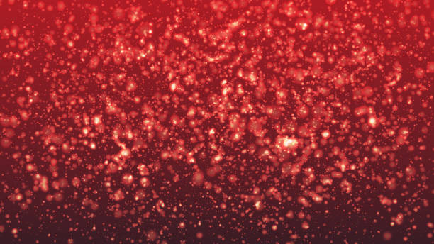 istock Abstract colorful bokeh and glowing spakling shining particles in random red color theme background. Lighting effects of flash. Blurred vector background with light glare, EPS10 illustration. 1085900312