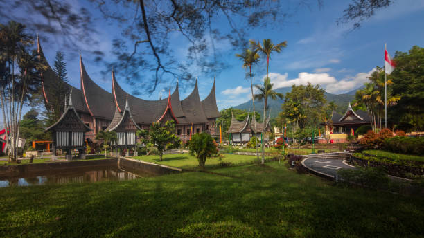 A typical Sumatran roofed house at the foot of Mount Marapi