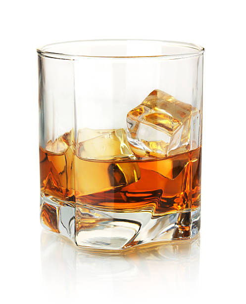 istock Glass of whiskey on ice on a white background 108590314