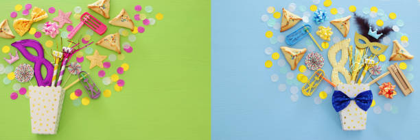 istock Purim celebration concept (jewish carnival holiday) over blue wooden background. Top view. 1085911088