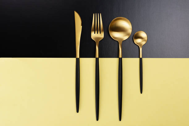 istock Set of black and gold cutlery 1085917530