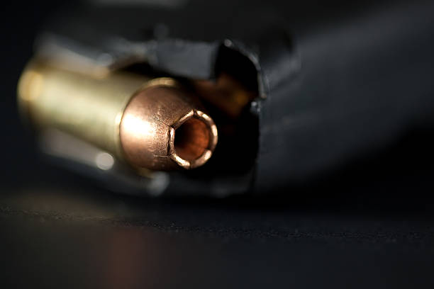 istock Hollow point bullet in magazine clip 108592255