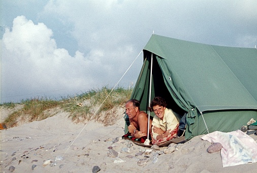 Bergen aan Zee, The Netherlands, 1965. Holidaymakers camp on the Dutch North Sea coast between the sand dunes.