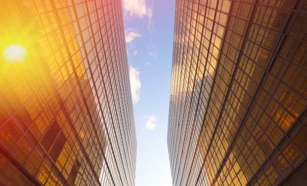 istock Modern buildings in business district against blue sky 1085952846