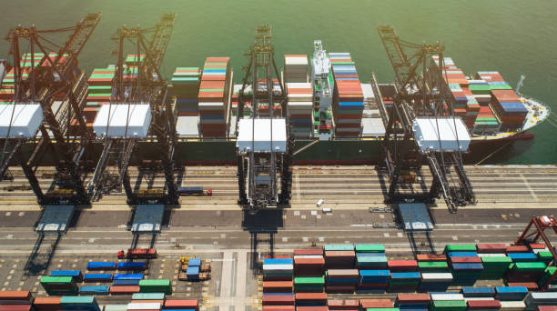 istock The containers is loaded / unloaded at Container Terminals Of Hong Kong. 1085952902