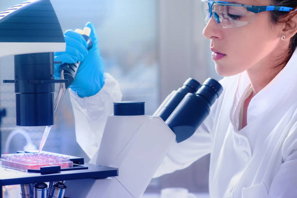 istock Female Scientist Holding Laboratory Equipment At Laboratory 1085952908