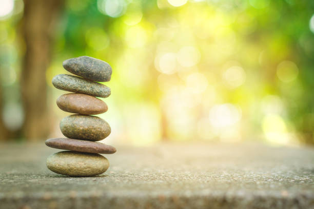 istock Banlance stone with spa on abstract bokeh background 1085958372