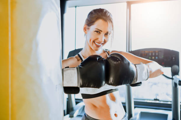 istock Young boxing woman posing 1085966288