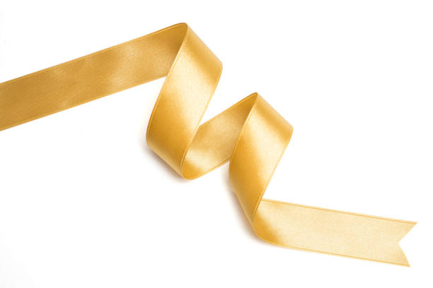 istock Gold ribbon in roll on white background 1085968170