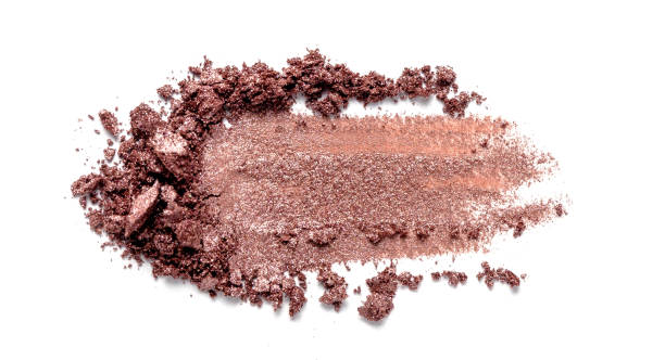istock Eye shadow on a white background. Scattered blush sample for makeup. Brown color. 1085974022