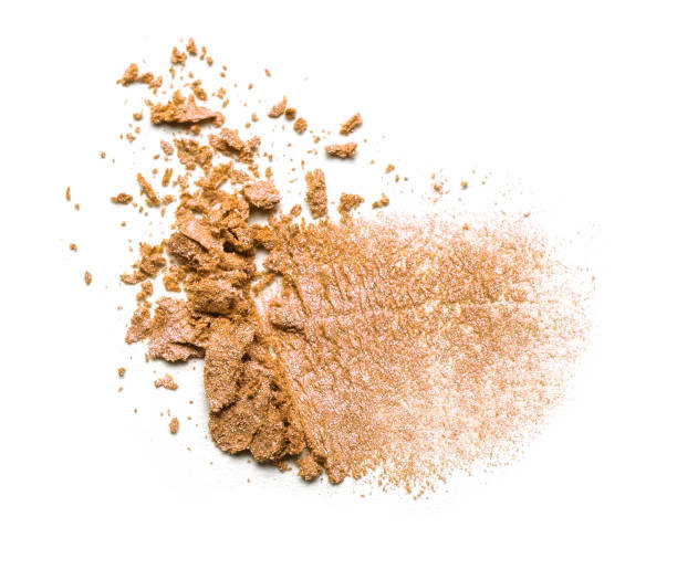 istock Eye shadow on a white background. Scattered blush sample for makeup. Orange color. 1085974220