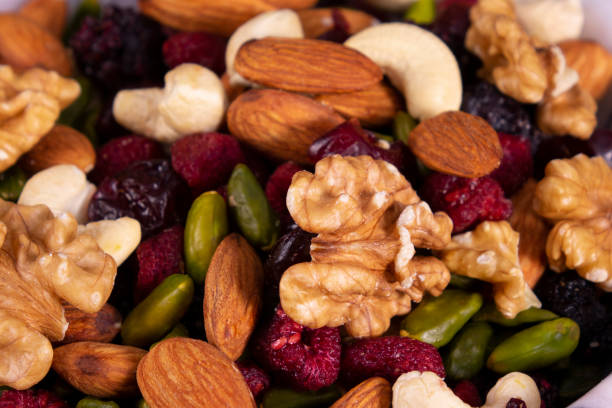 close up fresh nuts mix - healthy eating macro close up nut imagens e fotografias de stock