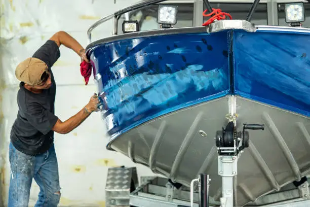 Photo of Aluminum boat painting procedure at service center