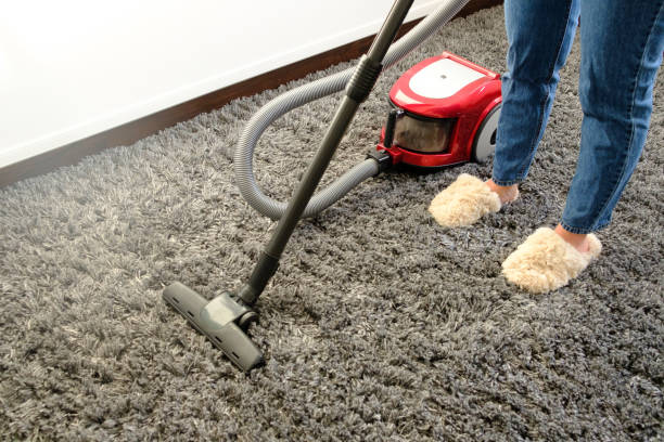 istock Girl vacuuming 1085985218
