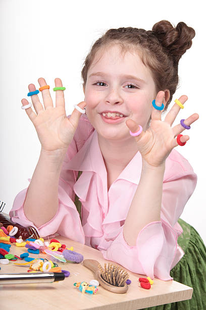 istock Young girl with artistic bands on fingers 108598576