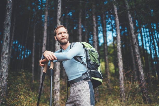 istock Tourist man hiking in the mountain 1085991242