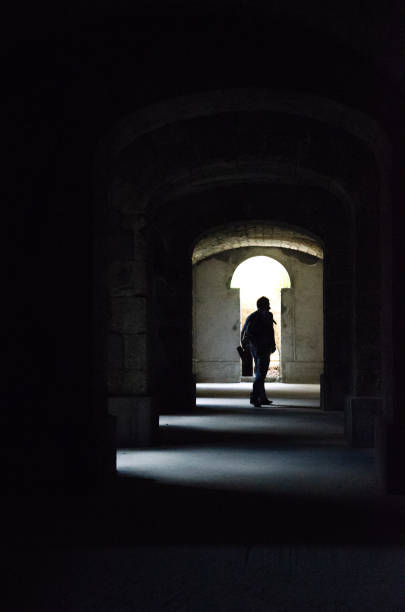 istock man walks in the darkness 1086003834