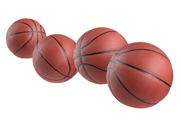 istock four brown basketballs jumping, on a white background 1086008056