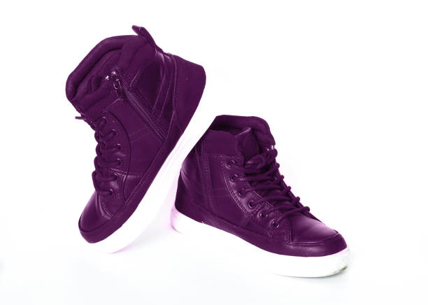 istock purple leather sneakers on white background isolated 1086011644