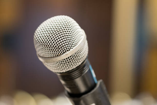 istock Microphones for speech or speaking in seminar room 1086011848
