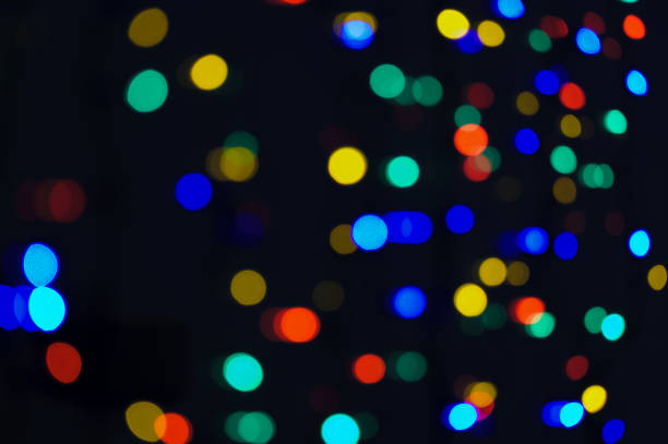 istock Abstract colorful blurred out of focus lights, bokeh background 1086016704