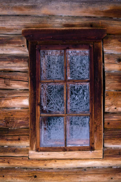 istock window in the log wall of an old building 1086019366