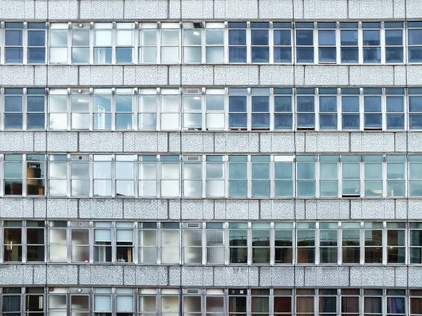 istock the facade of a large office office building with rows of repeating windows 1086019534