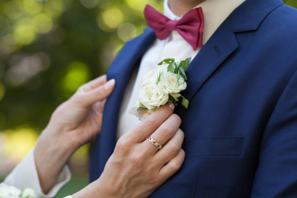 istock flowers on the jacket of a groom 1086024892