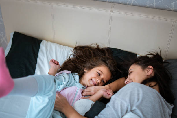 istock Mom and her little girl having fun 1086027018