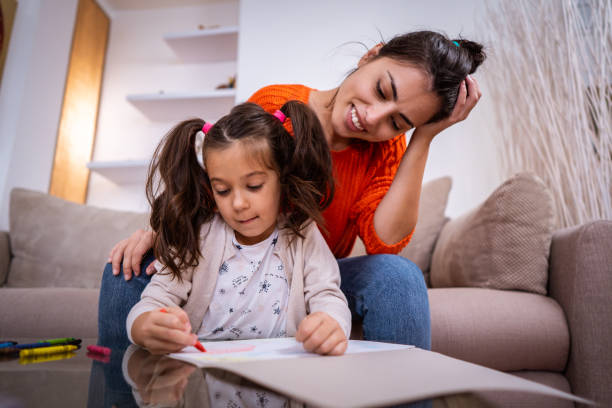 istock Mother and daughter spending relaxing day at home 1086027270