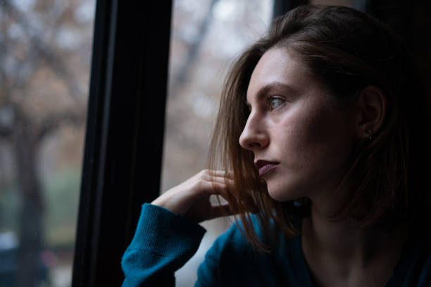 istock Contemplated young woman 1086038634