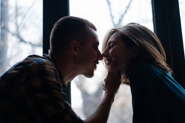 istock Romantic couple kissing 1086038778