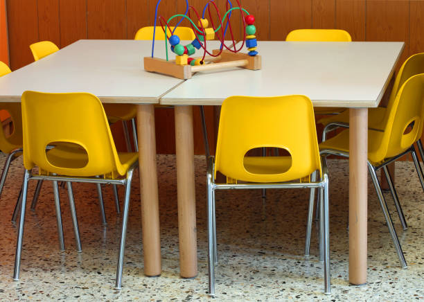 istock chairs with a toy over the desk inside the nursery 1086045404