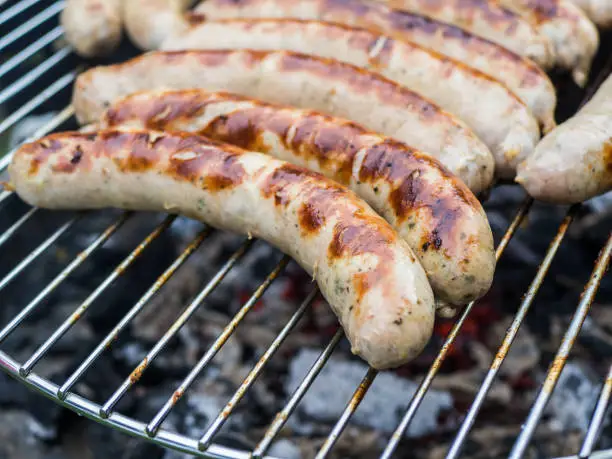 Photo of delicious barbecue bratwurst